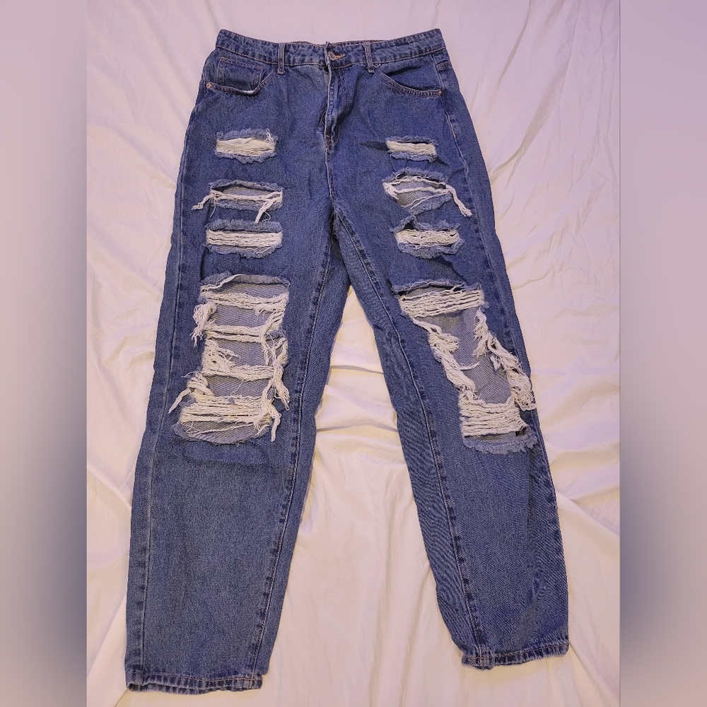 High-waisted ripped baggy blue jeans